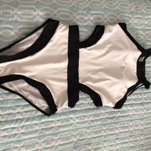 A black and white one piece